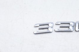 06-11 BMW E90 330I REAR TRUNK LID EMBLEM BADGE E2804 image 2