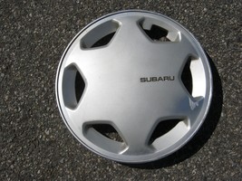 One genuine 1987 to 1989 Subaru GL 13 inch hubcap wheel cover 23832GA220 - $20.53