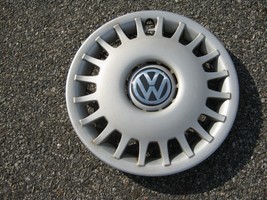 One genuine 1999 to 2002 Volkswagen Golf Cabrio 14 inch hubcap 1H0601147AFED - $46.40