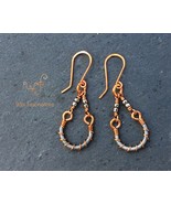 Handmade earrings: mixed metal curved coil with copper and stainless steel - €25,67 EUR