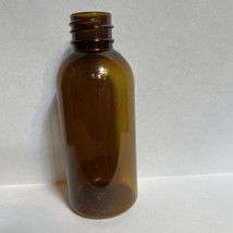 1oz PET clear cosmo round bottle with 20-410 neck finish- 1000/Case Brown - $371.25
