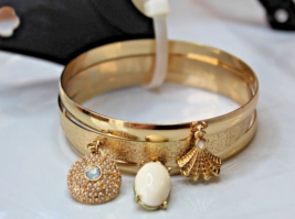 Gold Tone Bangle Bracelets 3 Bracelets W Charms Seashell Pearl Round Charm - £13.29 GBP