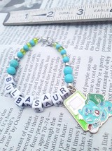 Pokemon Bulbasaur Kids Charm Bracelet Teal Beads 6 inch - £5.64 GBP