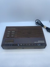 Magnavox D-3150 Vintage 2-Band Faux Woodgrain Clock Radio - $35.48 CAD