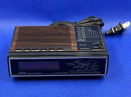 LYNX MODEL U181 AM/FM Alarm Clock Radio World Time Woodgrain Retro - £15.24 GBP