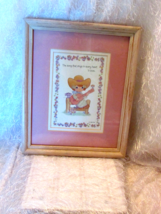 "A song that sings in every heart is love" 1996 print, wood frame (pantry) - $1.20
