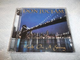 World on a String [Audio CD] Don Juceam - £7.58 GBP