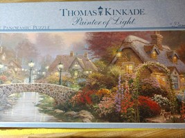 Puzzle Vintage Thomas Kinkade Lamplight Bridge 700 pc Panoramic Puzzle - $24.99