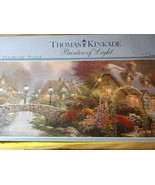 Puzzle Vintage Thomas Kinkade Lamplight Bridge 700 pc Panoramic Puzzle - $24.99