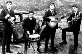 The Beatles John Paul Ringo & George with Instruments by Old Car 24x18 Poster - $23.99