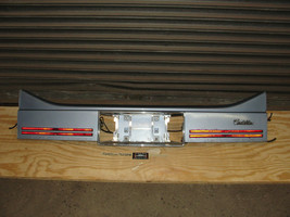 Oem 87 Cadillac Deville Fwd Rear Trunk Bumper Filler Panel Trim With Reflectors - £225.83 GBP