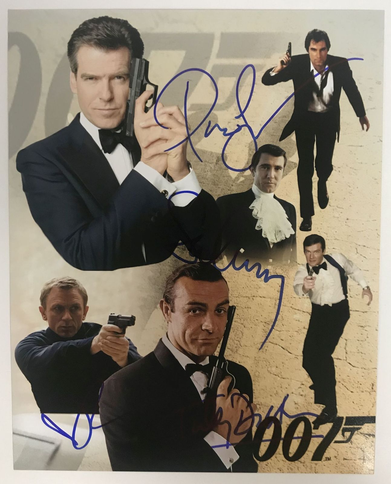Connery, Dalton, Brosnan & Craig Signed Autographed "James Bond" 8x10 Photo - $599.99