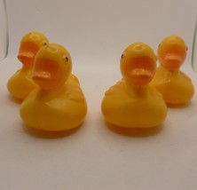 Yellow mini ducks set of 4 hard plastic. Read Description.  - $9.90
