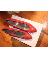 Red pumps with designs on heels and toes- $65 - $25.99