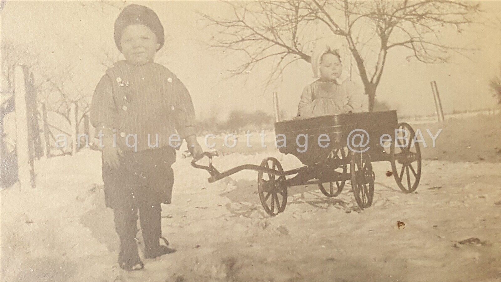 antique adorable LITTLE BOY CHILD pulling SISTER IN WAGON snowy scene ...