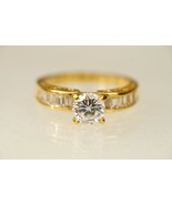 Costume Jewelry 7MM Solitaire CZ Channel Set Gold Tone Metal Ring Size 9 - £19.46 GBP