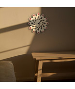Contemporary natural wooden wall clock made of bent plywood - Galaxy - $119.00