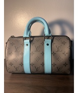 Louis Vuitton keepall bandouliere Turquoise Monogram Eclipse Size 25 - $1,250.00