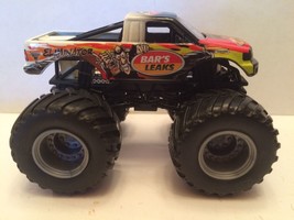 Hot Wheels Monster Jam Truck 1:64 plastic base Bar&#39;s Leaks monster truck - $16.82