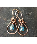 Handmade copper earrings: teardrop framed spiral wire wrapped blue crystal - €21,39 EUR