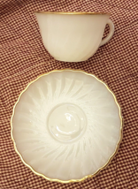 Anchor Hocking White Swirl Tea Cup Saucer Golden Anniversary Milk Glass Gold Rim - $7.85