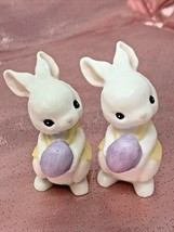 Pair 1984 Hallmark Easter Merry Miniature White Ceramic Bunny Holding Purple Egg - $14.20
