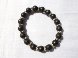BLACK HOWLITE BEADS with BALI BEAD SPACERS STRETCH BRACELET 7.5 - 8.5&quot; - $91.86 MXN