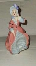 7.5&quot; Ceramic Victorian Lady Kicking Up Dress Vintage Figurine - £11.83 GBP