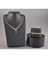 Authenticity Guarantee

*Elegant 14k Ruby Diamond Bracelet &amp; Necklace Set - $9,525.26 CAD