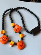 Long Black Round w Halloween Pumpkin Jack O Lantern Candy Corn Plastic Bead Neck - $11.29