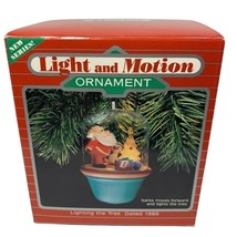 Light and Motion Hallmark Ornament- Lighting the Tree Santa Lights the Tree - $14.42