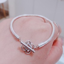 925 Sterling Silver Moments Peace Knot T-bar Snake Chain Bracelet  - £26.21 GBP+