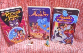 Lot: Disney Aladdin 1, 2, &amp; 3 VHS Movies + Princess Jasmine PVC Figure + a Gift - £14.81 GBP