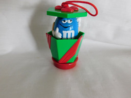 M Ms Blue in Pop Up Present Ornament Topper 2 1/4 Inches Tall 2000 - $3.99