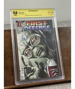 First Defense 2 CBCS 9.8 Signed By Benny And Jenna Powell White Page Comics - $904.58 MXN