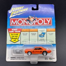 Johnny Lightning Monopoly Chance Card Dodge Dart Rear Motor Orange Car 1/64  - £13.61 GBP