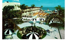 Vintage Golden Nugget Miami Florida Postcard people grass patio pool ocean - £5.42 GBP