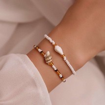 Summer bracelet filigree bracelet small beads and shell stretch bracelet - £13.66 GBP