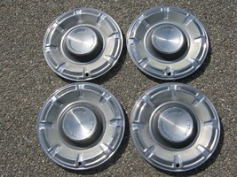 Genuine 1970 to 1977 Ford Maverick 14 inch hubcaps wheel covers - $46.40