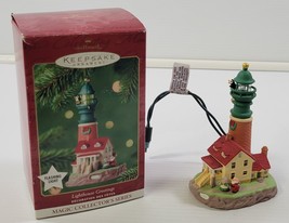 *X) 2001 Hallmark Keepsake Lighthouse Greetings Magic Christmas Ornament - $9.89