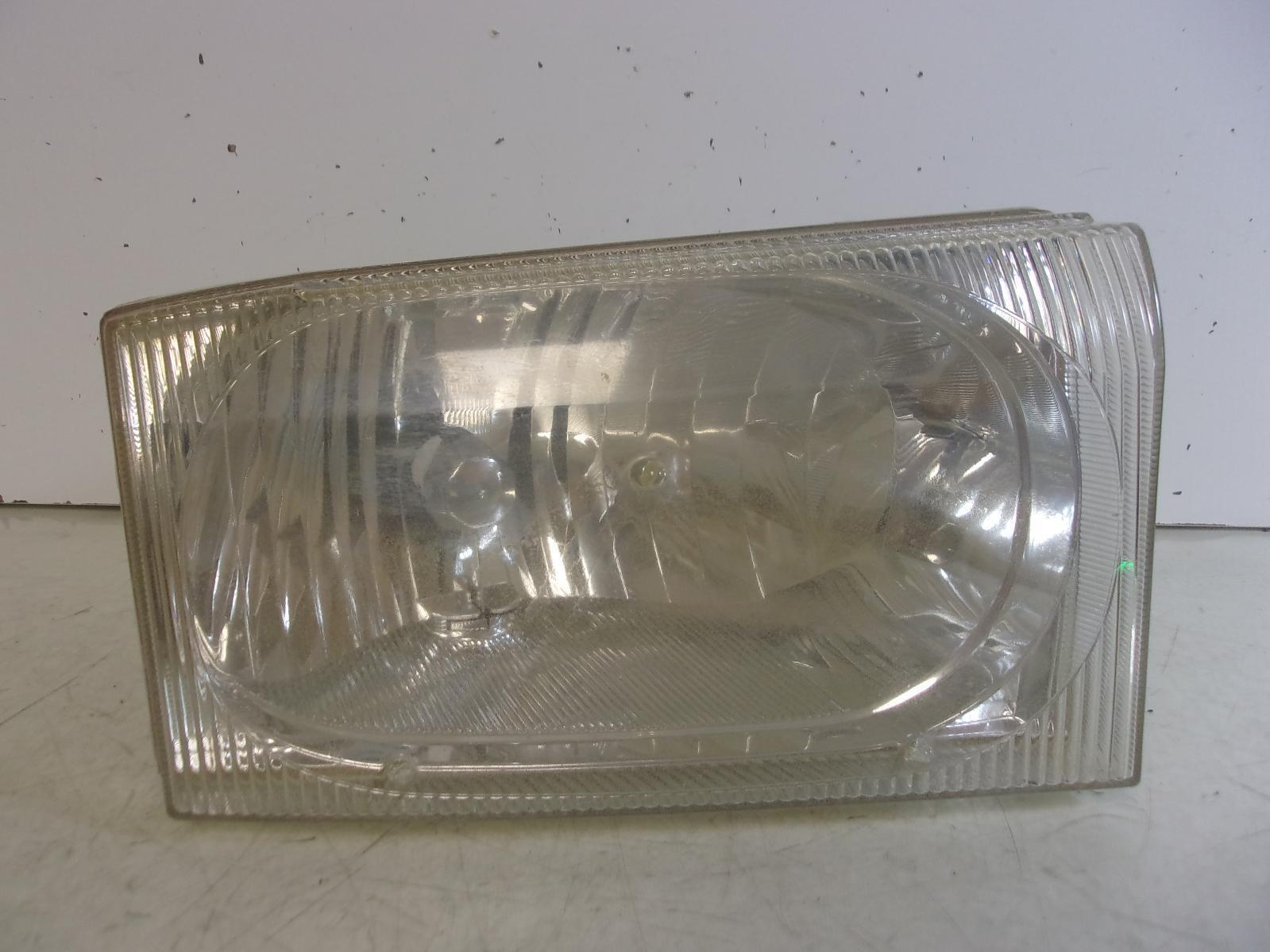 2002-2004 Ford F250 / F350 / Excursion Passenger RH Headlight OEM - $39.20