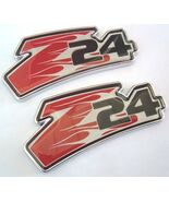 Two 86-95 Chevy Cavalier Z-24 Z24 Fender Emblems Emblem Sign Decal Flame... - $13.85