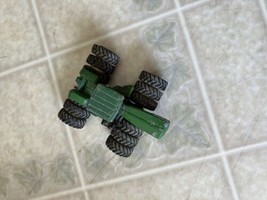 John Deere 4WD Tractor Die Cast Ertl 12 Triple Wheels 37308 1:64 - $17.65