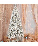 9FT Flocked Snowy Christmas Tree with 750 Warm White LED Lights - $388.99