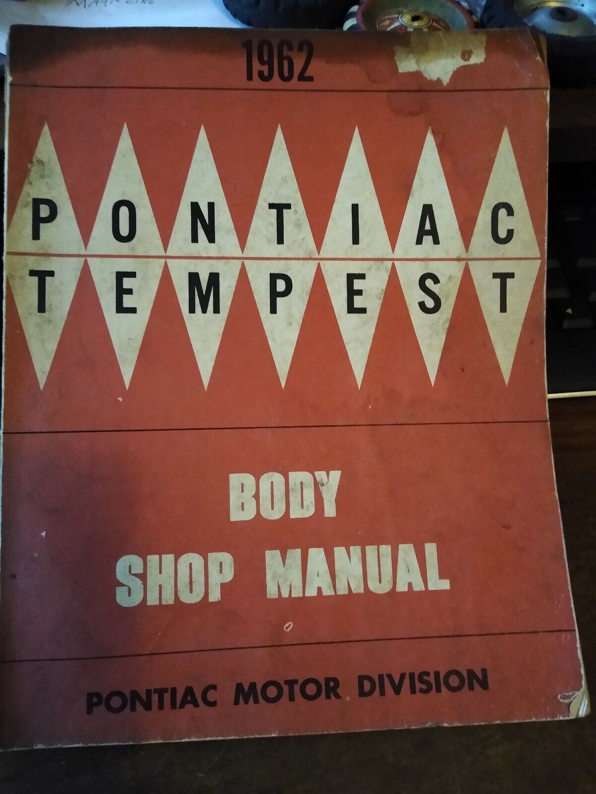 Primary image for 1962 pontiac &  tempest body shop manual original front cover torn off
