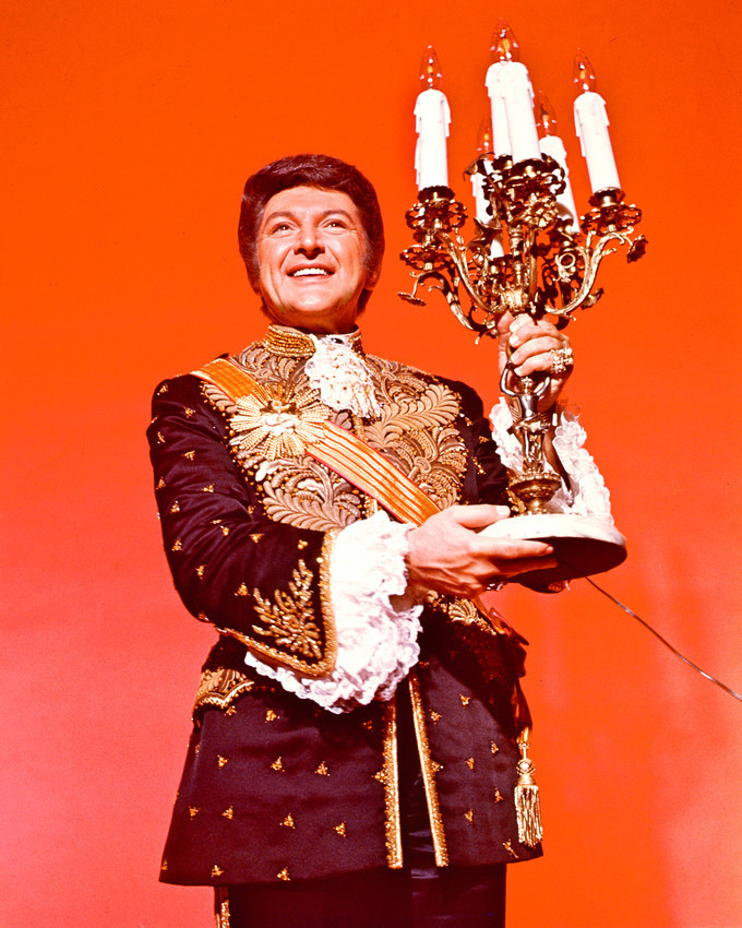 Liberace 16x20 Canvas Giclee classic holding candelabra - $69.99