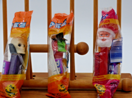 PEZ Witch w/green face &amp; Skull w/purple base + Santa Claus.  New in package - $19.80