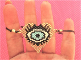Evil eye heart gold bead rope bracelet - €8,65 EUR