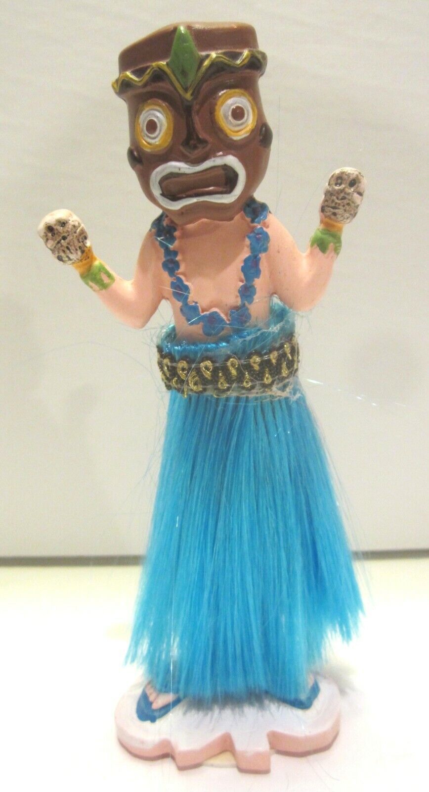 Primary image for Dancing Hawaiian Hula Dancer Wearing Warrior Mask Skulls on Hands Blue Skirt