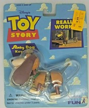 Vintage Sealed 1995 Toy Story Slinky Dog Keychain NIB Toys R Us Label - $16.99
